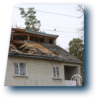 a damaged roof of a residential home